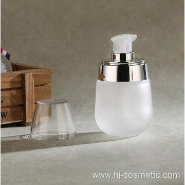 wholesales High-grade golden carved ABS cap transparent glass cosmetic bottles/jars with good price